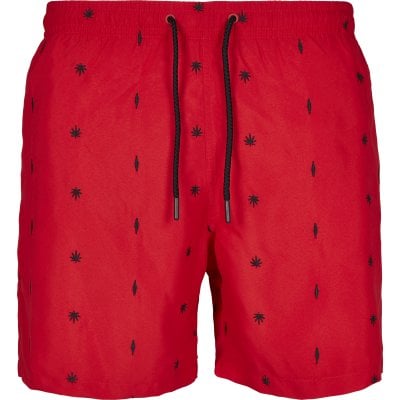 Red swim shorts with embroidered leafs 1